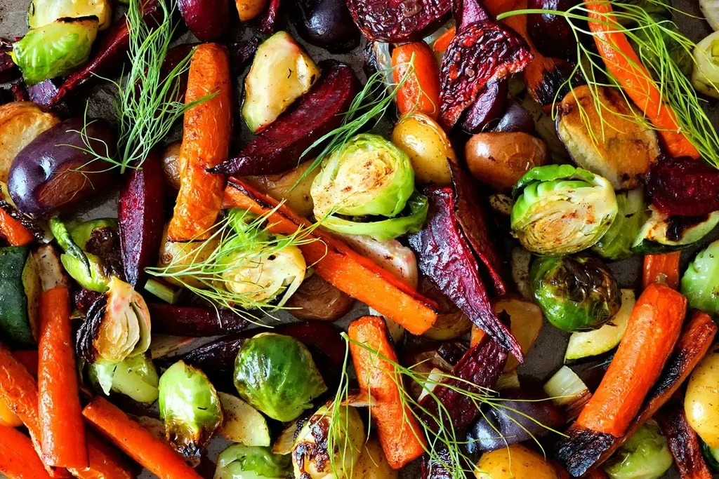 Close-up overhead shot of a colorful assortment of roasted vegetables.
