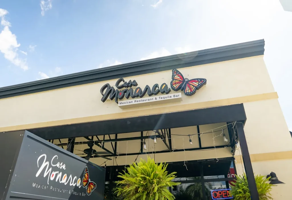 Casa Monarca Mexican Restaurant entrance, prominent signage with butterfly logo.