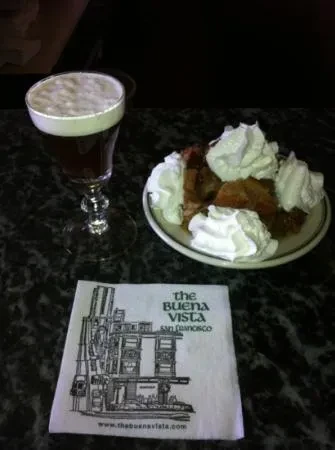 Irish coffee, dessert, and napkin from The Buena Vista, San Francisco.