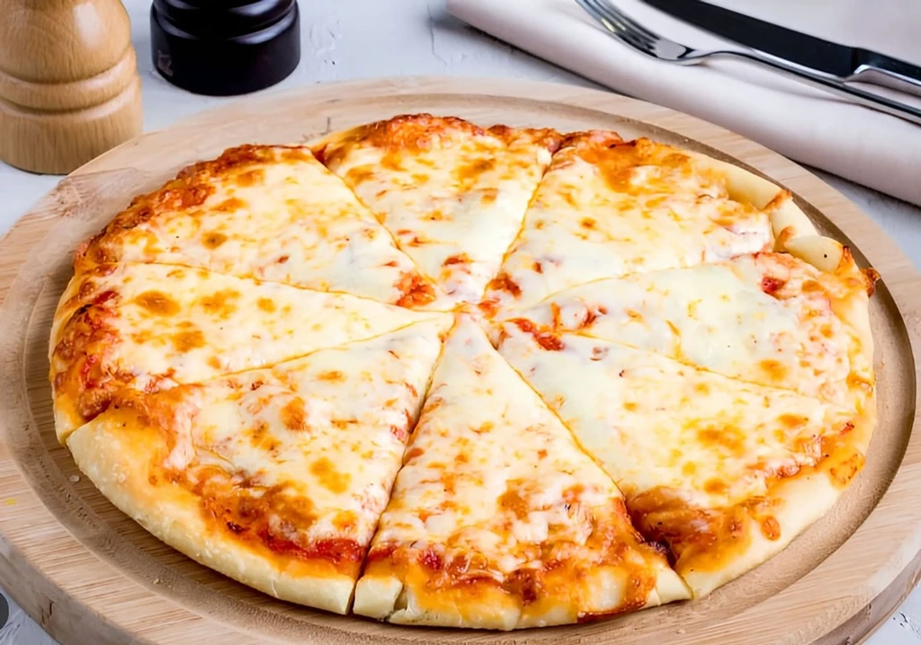A large cheese pizza cut into eight slices on a wooden board.