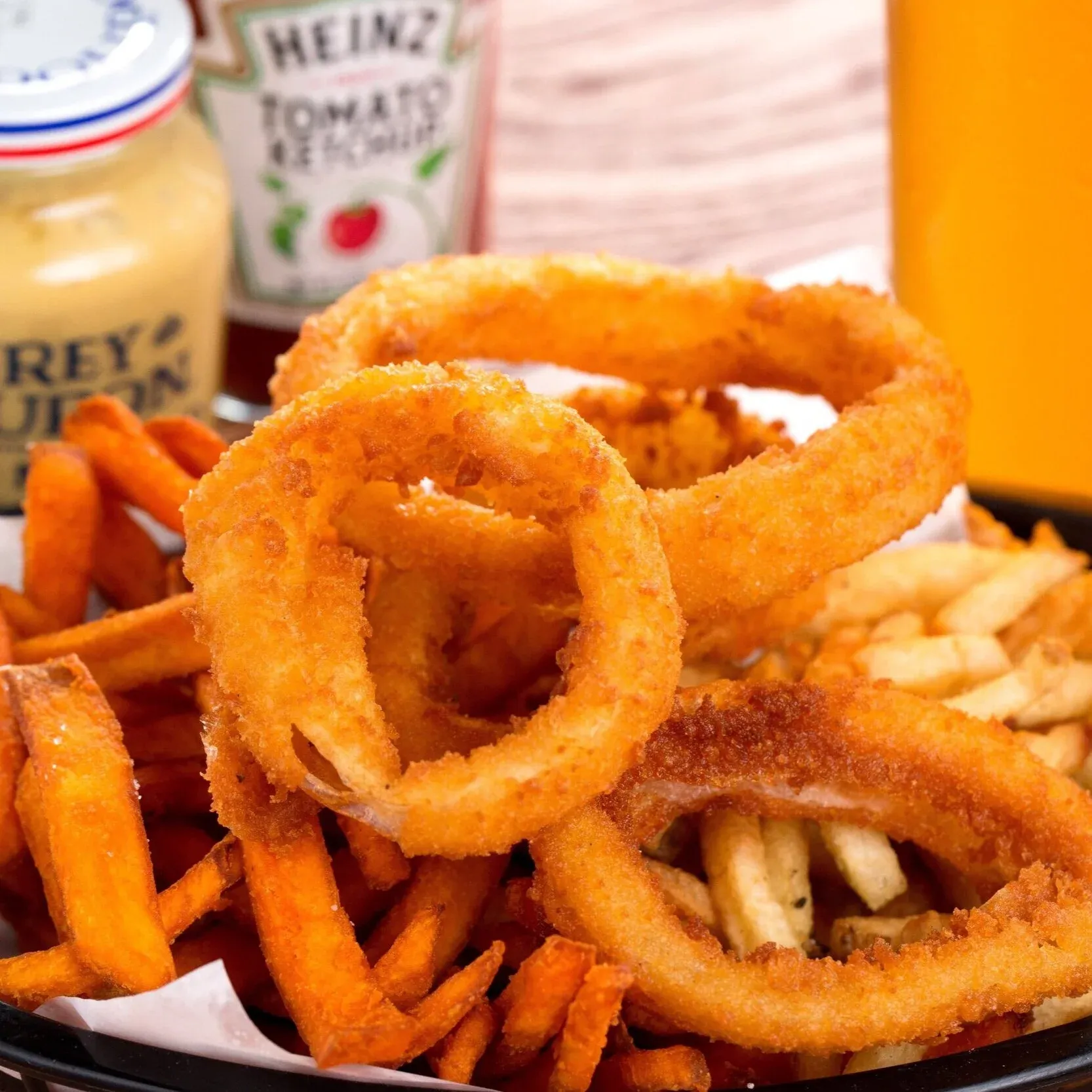 Onion rings, french fries, and sweet potato fries.