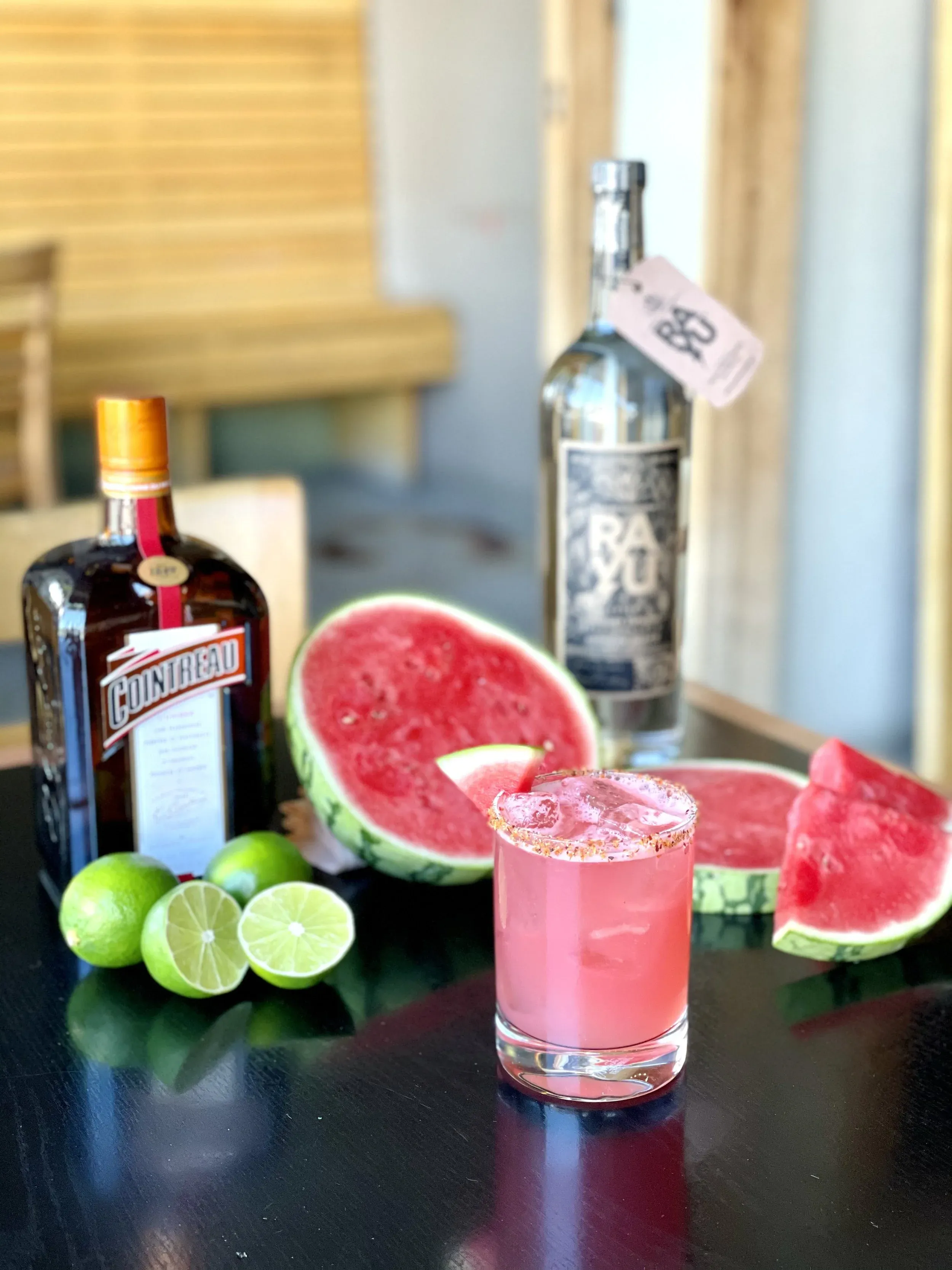 Pink watermelon cocktail with tequila, Cointreau, and fresh limes.