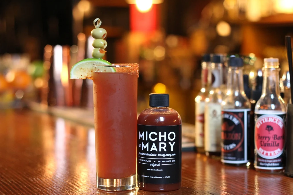 Spiced Bloody Mary with lime, olives, and Micho & Mary mix.