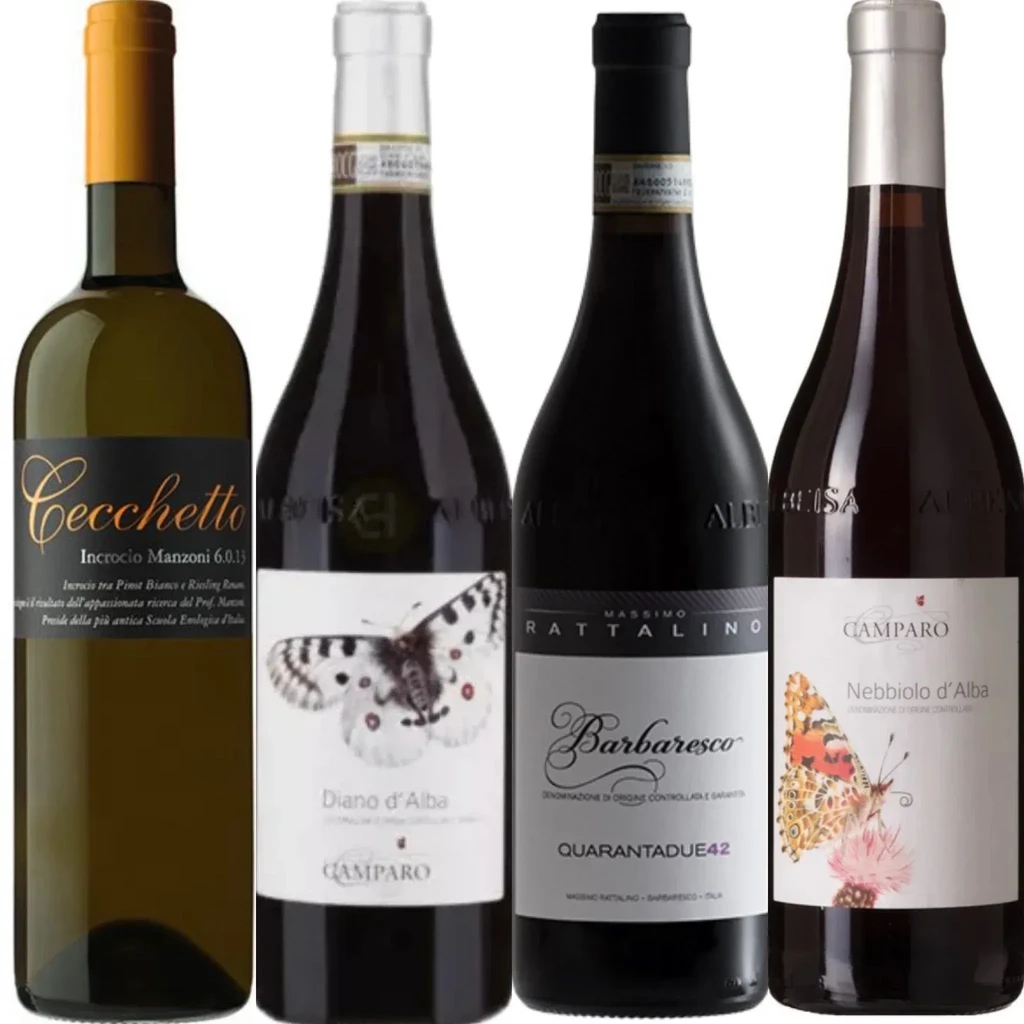 Four wine bottles with diverse labels, professionally displayed.