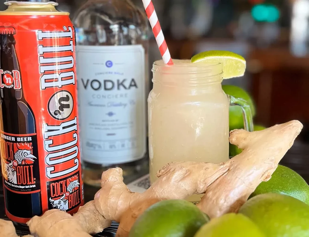 Moscow Mule ingredients: ginger beer, vodka, lime, ginger, and drink.