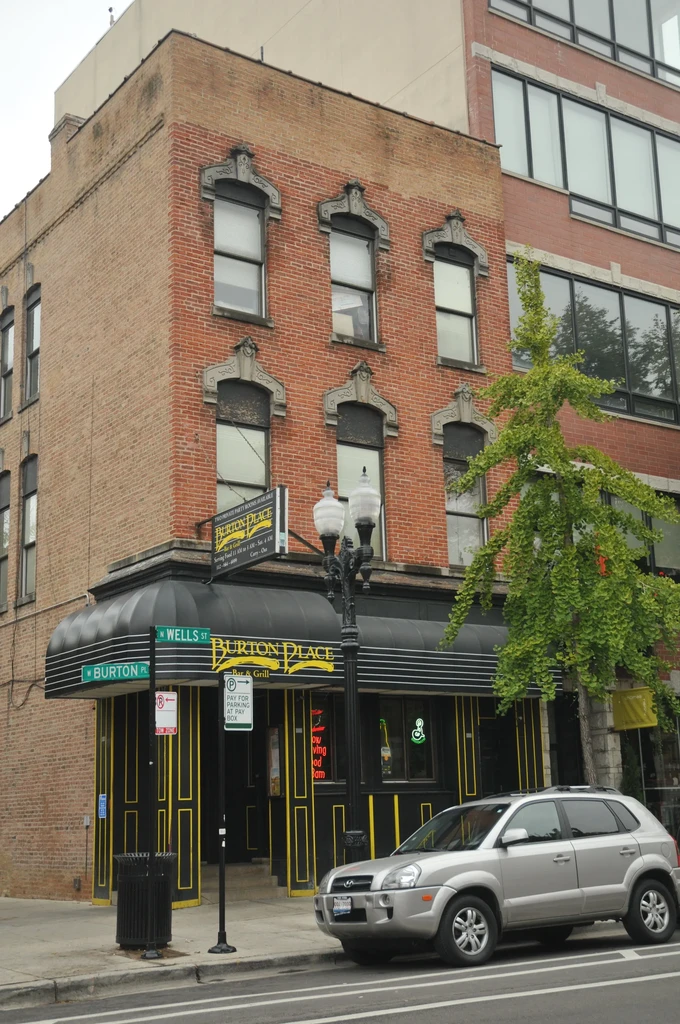Exterior of Burton Place Bar & Grill on a city street.