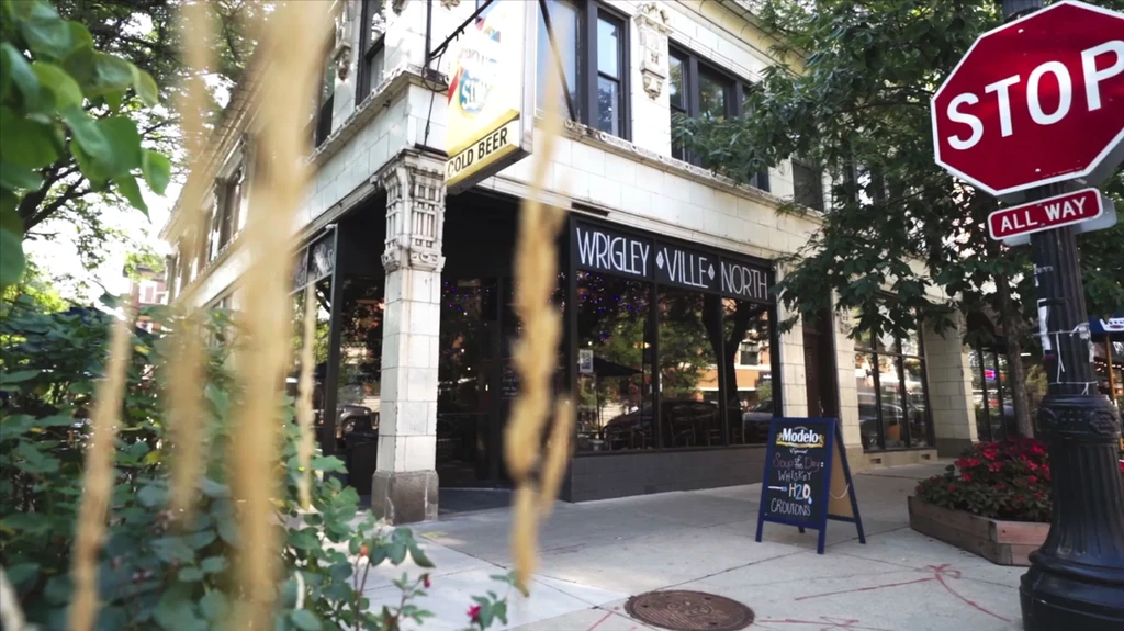 Exterior of Wrigleyville North restaurant with a "Cold Beer" sign.