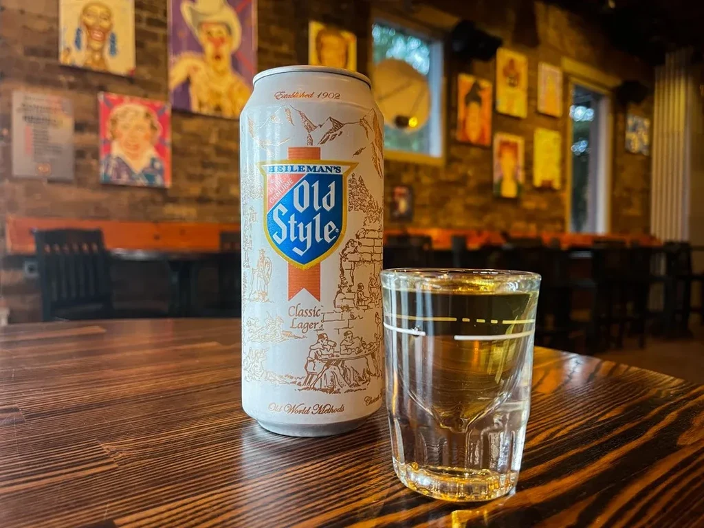 Can of Heileman's Old Style beer and a shot glass.
