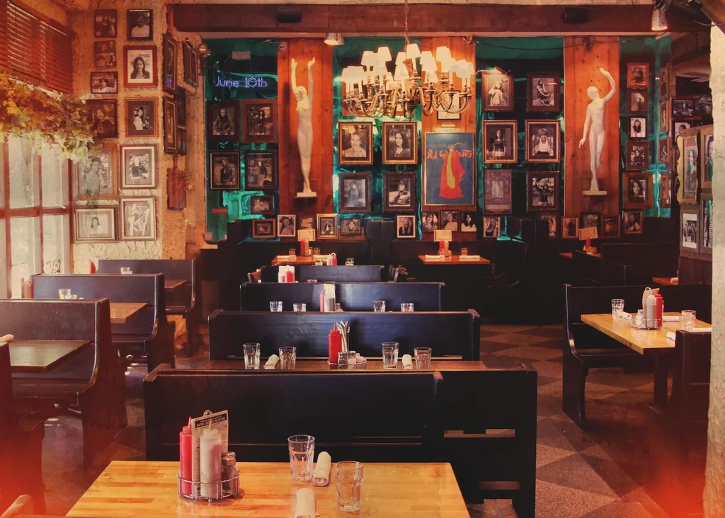 Interior of an empty restaurant with unique, eclectic, and vintage decor.