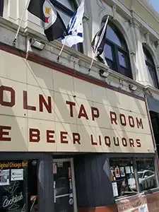 Lincoln Tap Room building exterior with "Beer Liquors" sign.