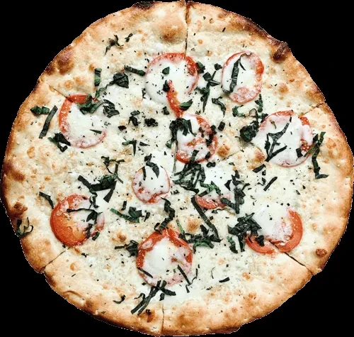White pizza with tomato, mozzarella, and basil on a black background.
