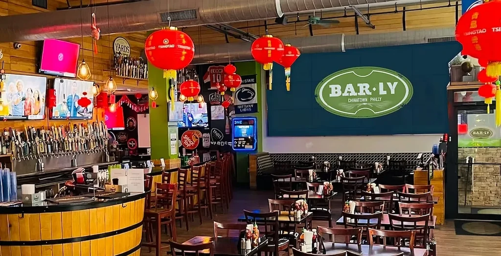 Industrial-Asian BAR LY Chinatown Philly restaurant interior with bar and dining.