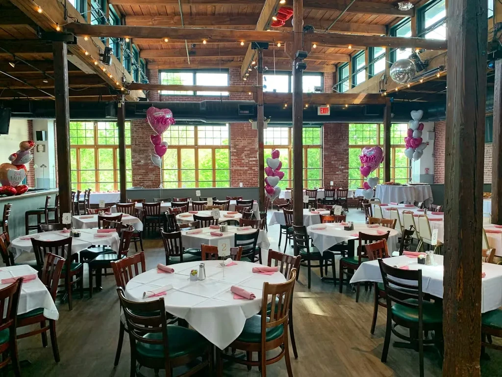 Empty industrial-rustic restaurant decorated for Mother's Day.