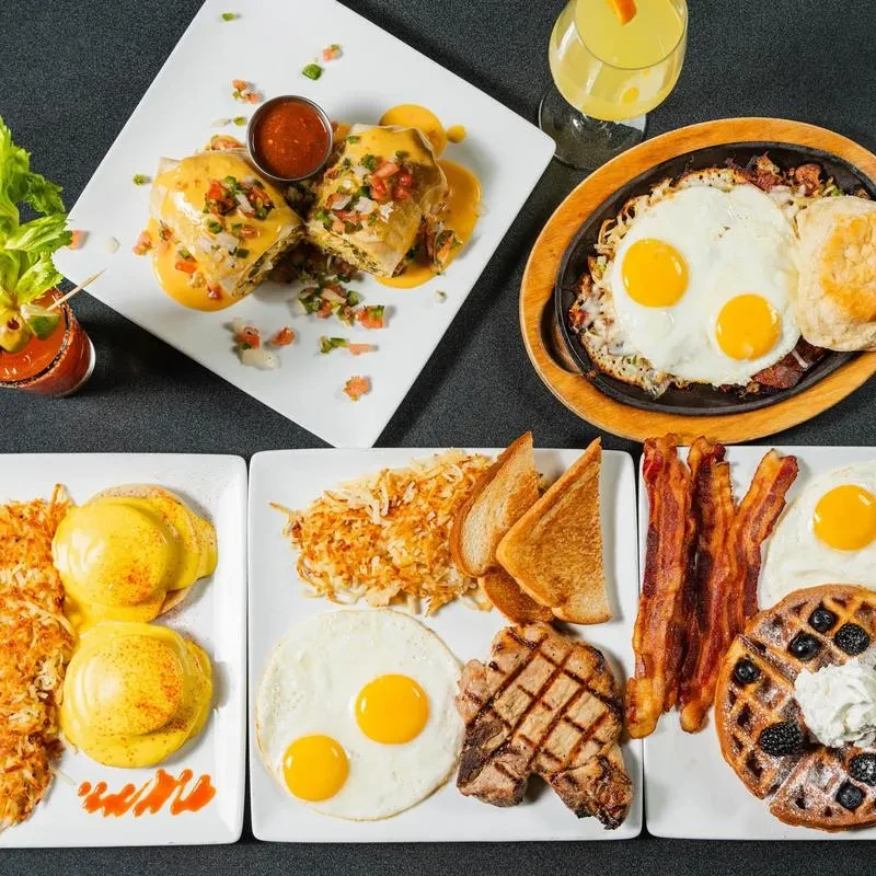 Top-down view of an elaborate breakfast and brunch spread.