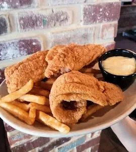 Golden fried fish/chicken strips, fries, onion rings, with dipping sauce.