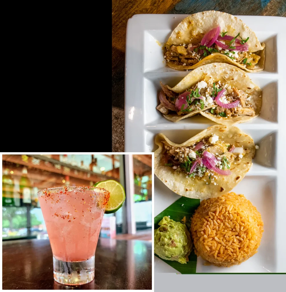 Three street tacos, rice, guacamole, and a spicy pink cocktail.