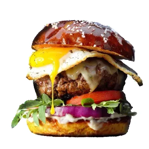 Gourmet burger with runny fried egg, melted cheese, and fresh ingredients.