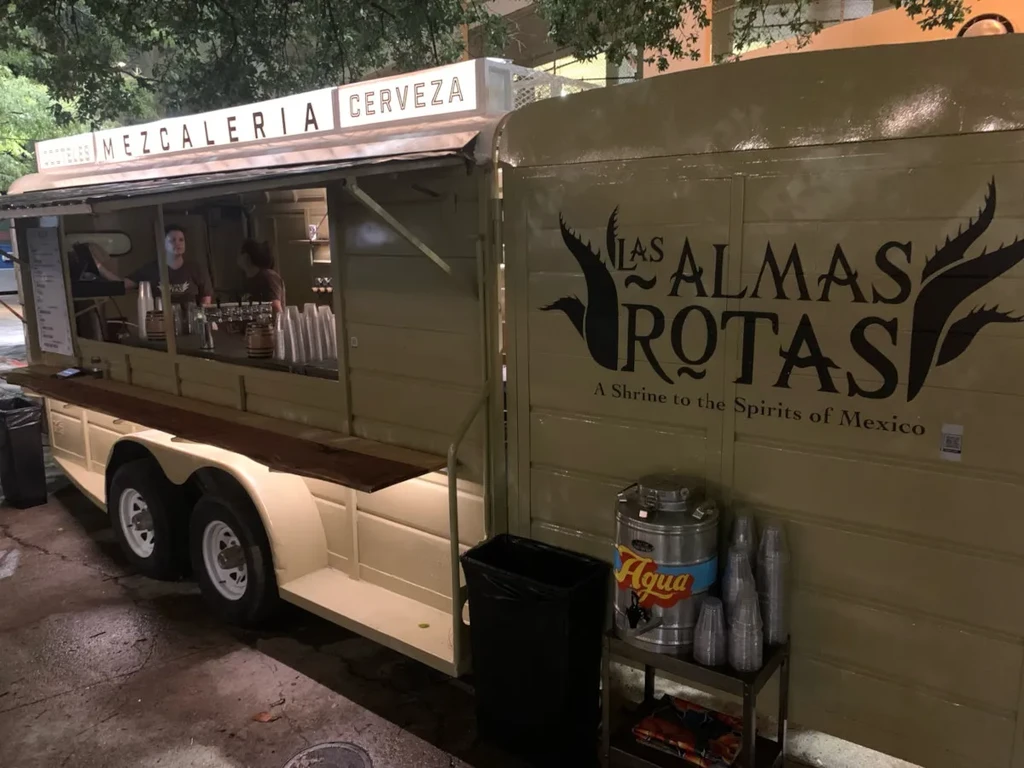 'Las Almas Rotas' mobile Mezcaleria Cerveza trailer with open service window.