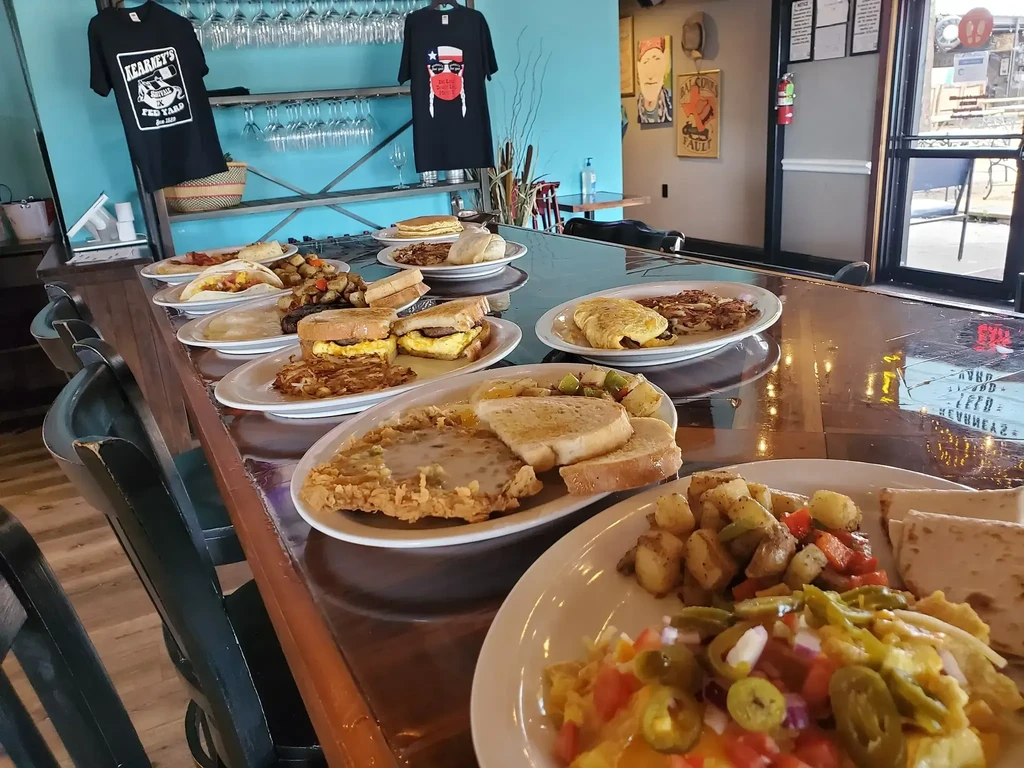 Assorted breakfast and brunch dishes arranged on a restaurant bar.