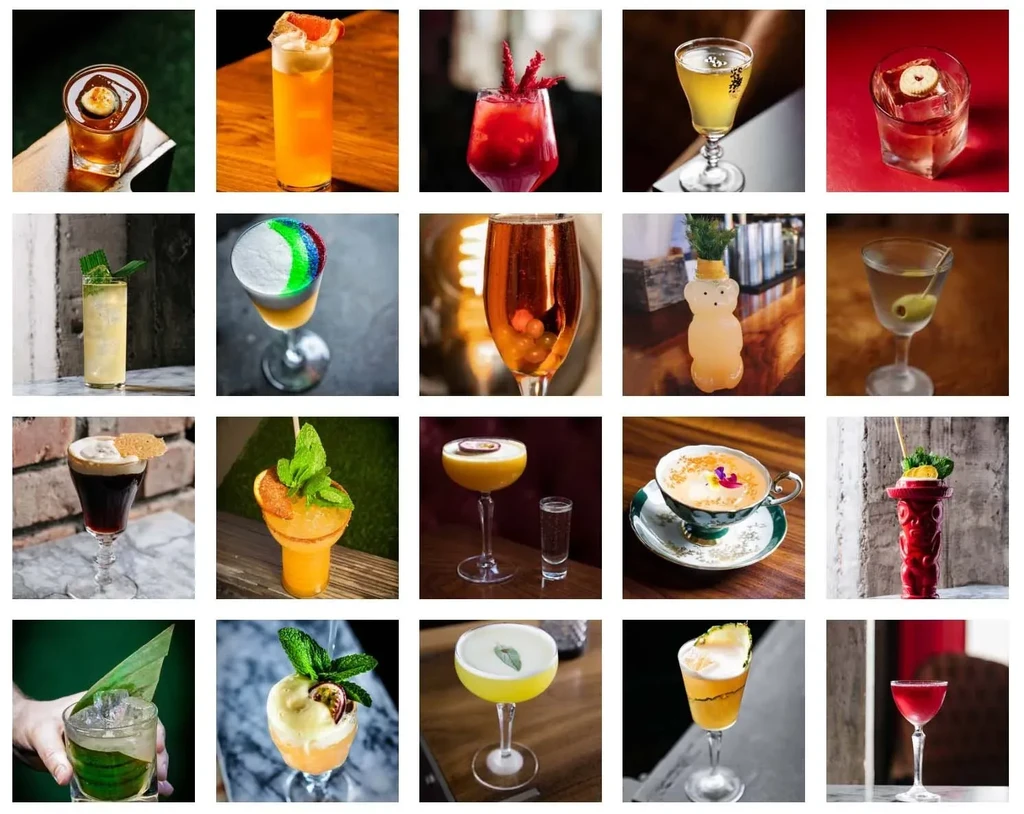 Grid of 20 distinct, colorful, garnished cocktails in varied glassware.