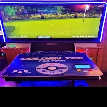 Golden Tee PGA Tour arcade, virtual golf on screen, vibrant neon glow.