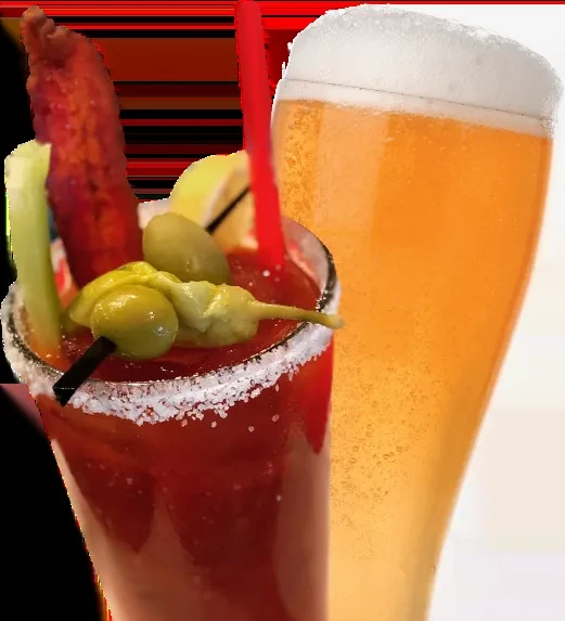 Elaborately garnished Bloody Mary and a foamy golden beer.