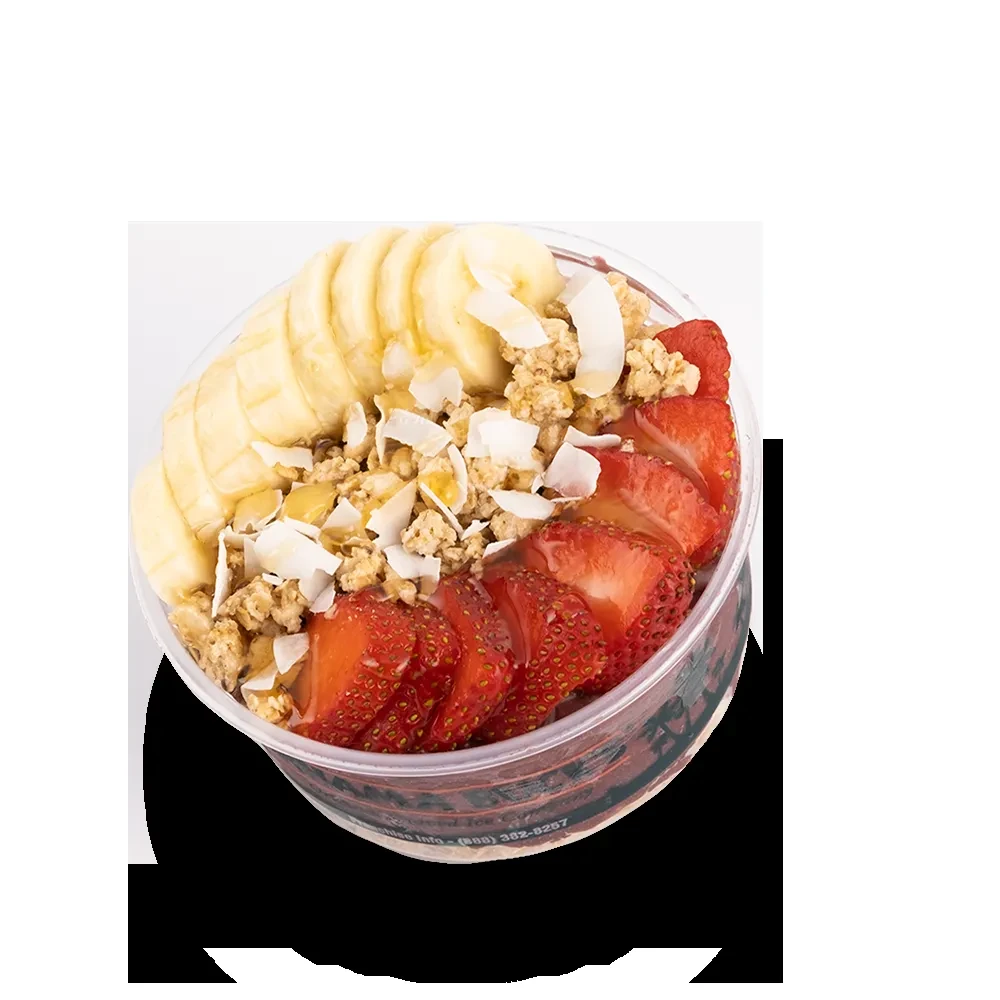 Açaí bowl with bananas, strawberries, granola, coconut in a take-out container.