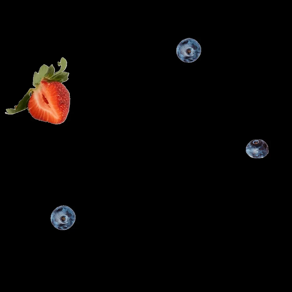 Halved strawberry and blueberries on a solid black background.