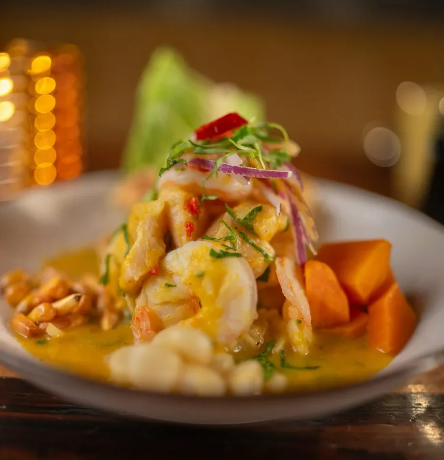 Shrimp and white fish ceviche with sweet potato and corn.