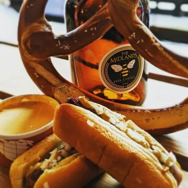 Salted pretzel, two hot dogs, and beer from The Midlands Beer Garden.