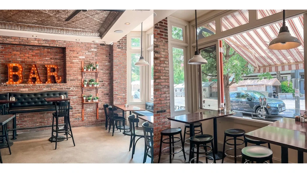 Rustic industrial bar interior with brick wall, 'BAR' sign, and street view.