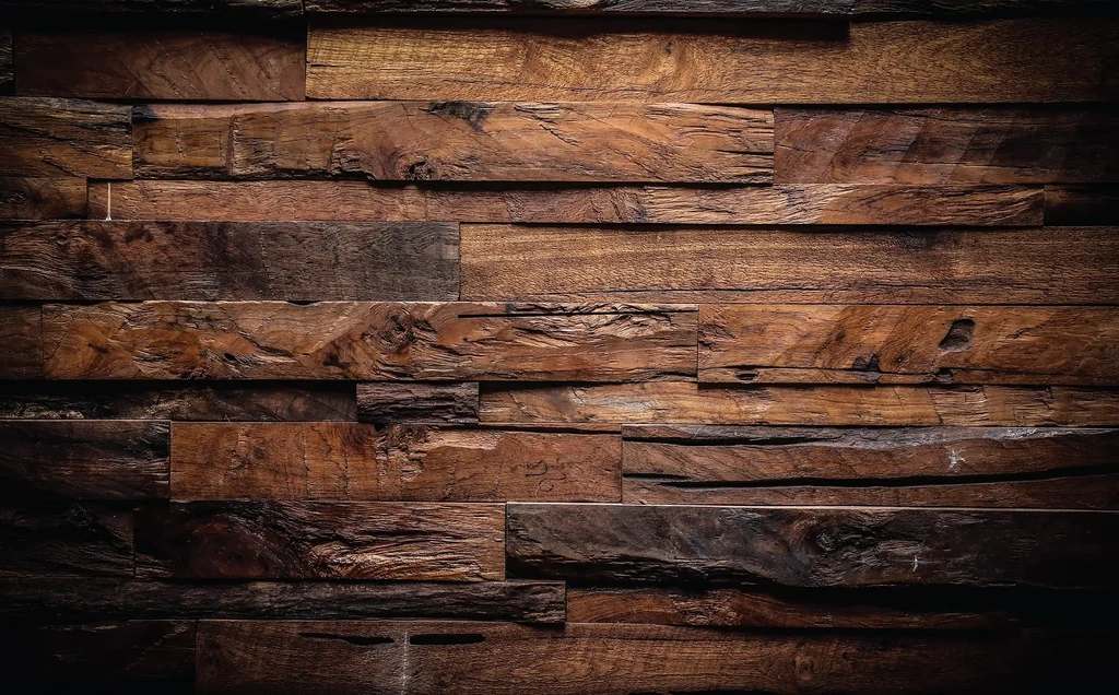 Textured wall of rustic brown horizontal wooden planks.