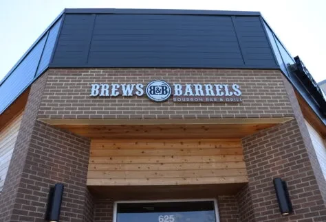 Brews & Barrels Bourbon Bar & Grill entrance facade with prominent sign.