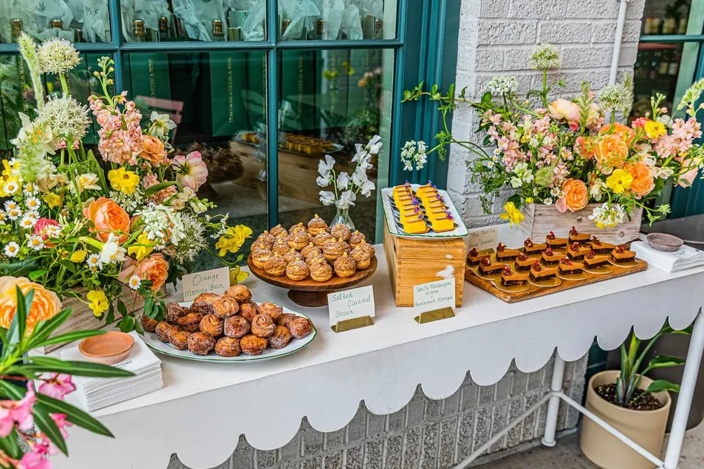 Outdoor dessert spread with Orange Momma Buns and Salted Caramel Choux.