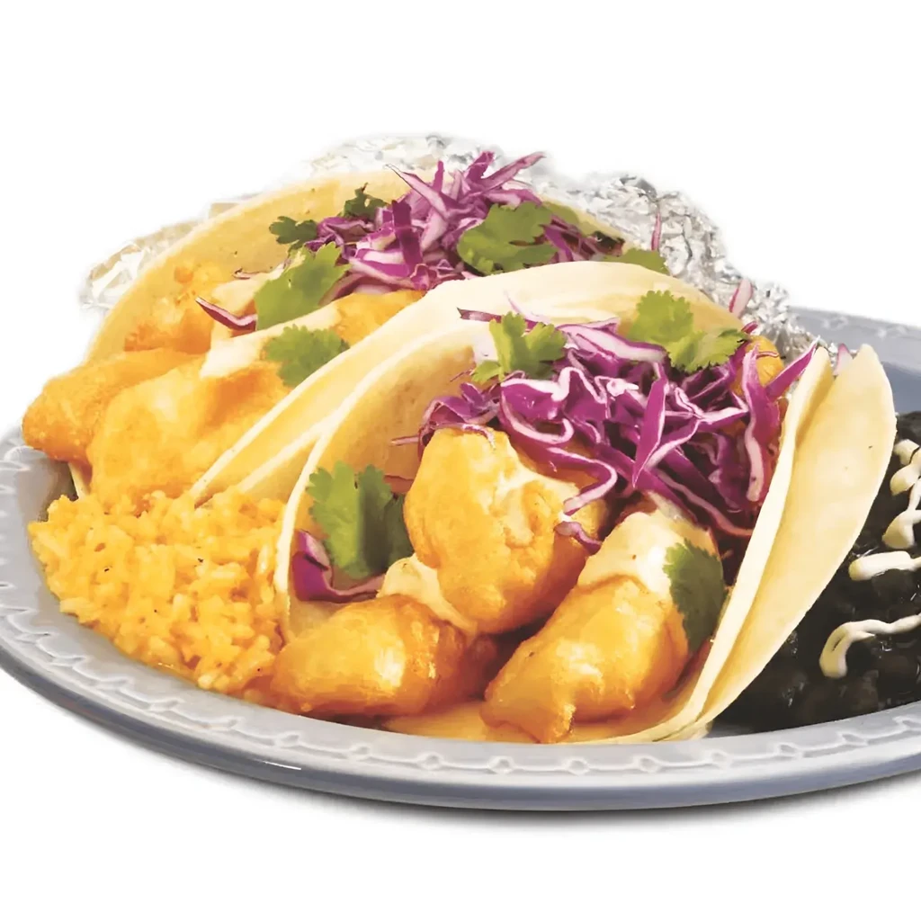 Plate with two fish tacos, yellow rice, and black beans.