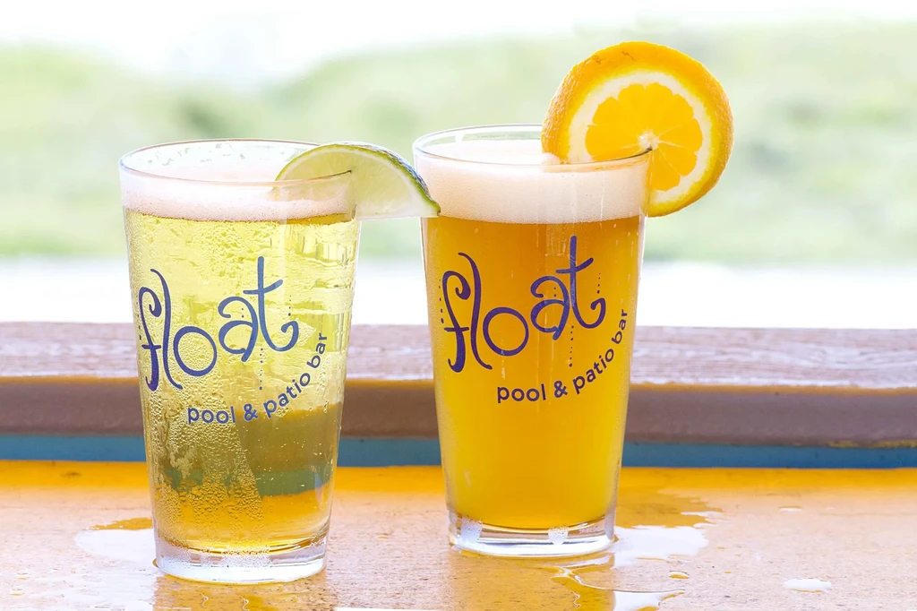 Chilled beverages with lime and orange, "float pool & patio bar" logo.