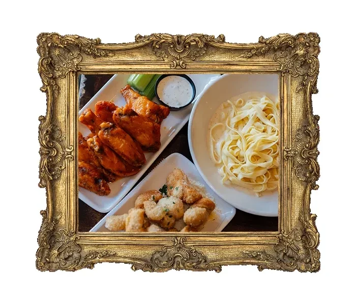 Ornate gold frame around three dishes: wings, pasta, fried items.