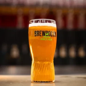 Brewdog India Pale Ale in a distinct glass on a bar.