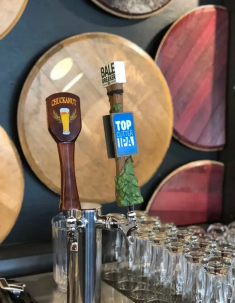 Chuckanut and Bale Breaker beer taps with clean glass mugs.