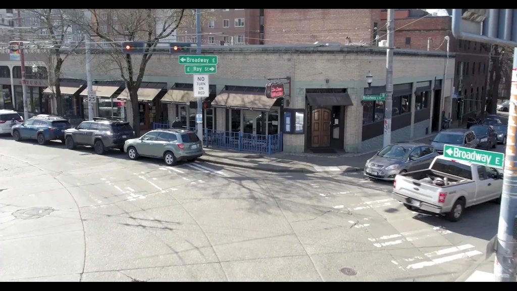 Daytime view of The Comet Tavern at an urban street corner.