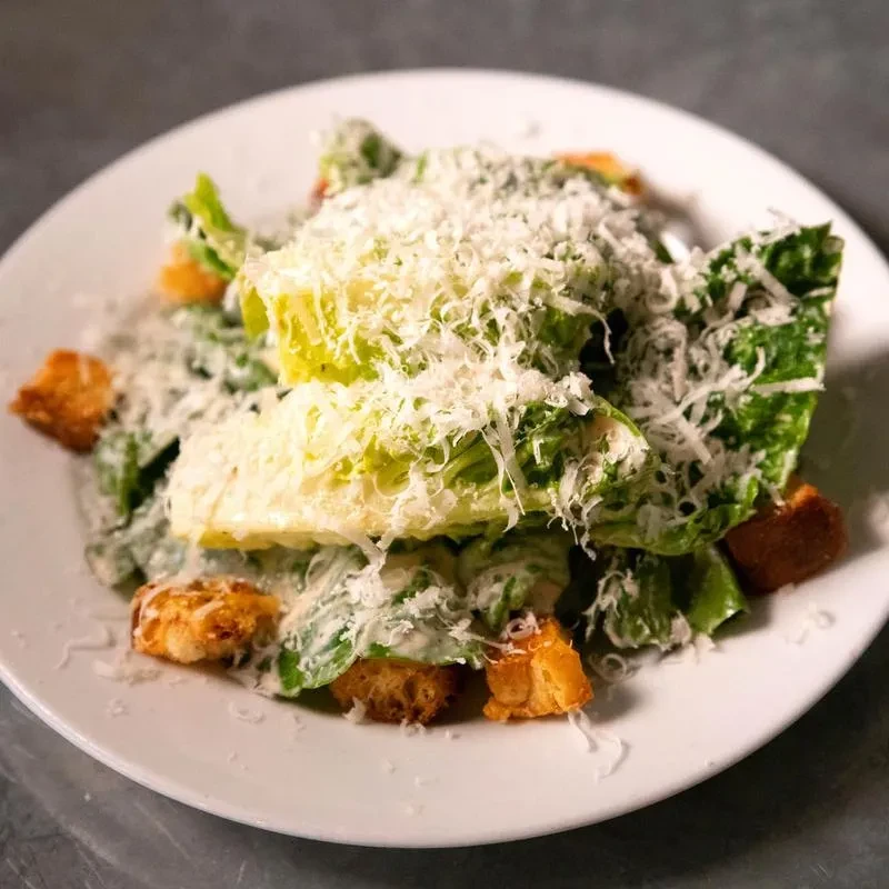Caesar salad with romaine, croutons, grated Parmesan, and creamy dressing.