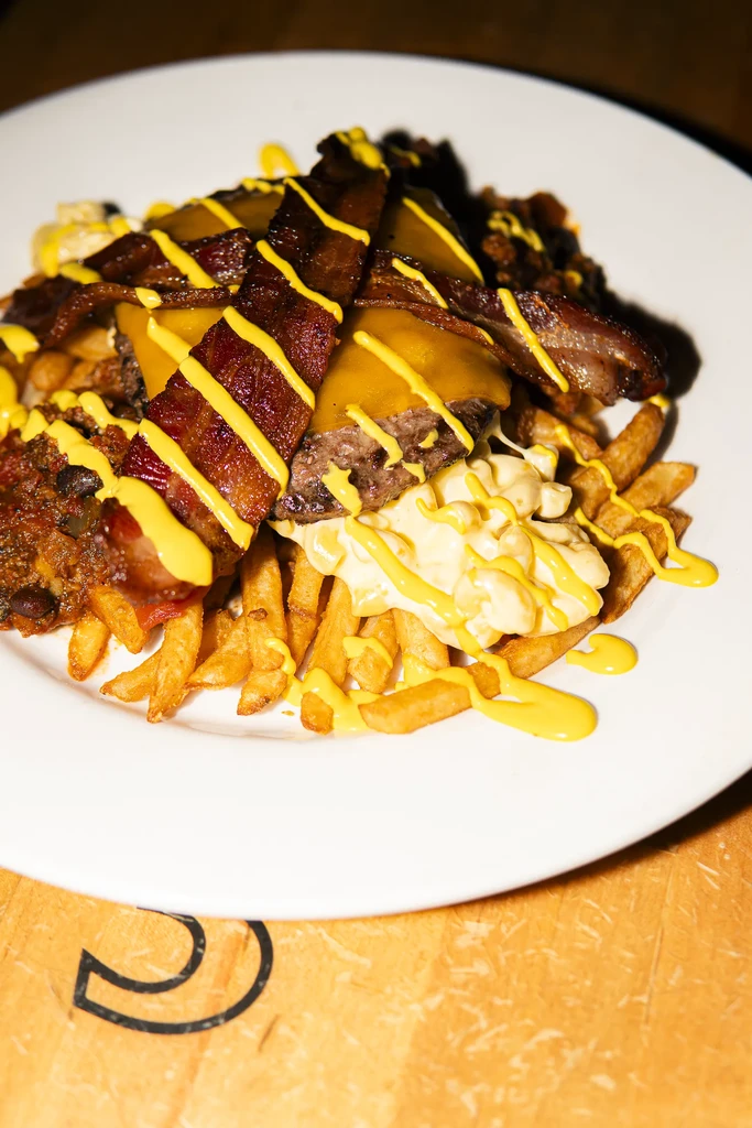 Loaded crinkle fries with beef, cheese, bacon, mac and cheese, chili.