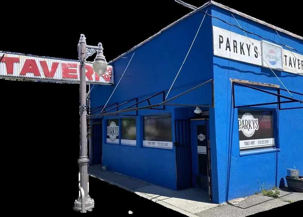 Vibrant blue Parky's Tavern and Pizza Bar exterior with signs.