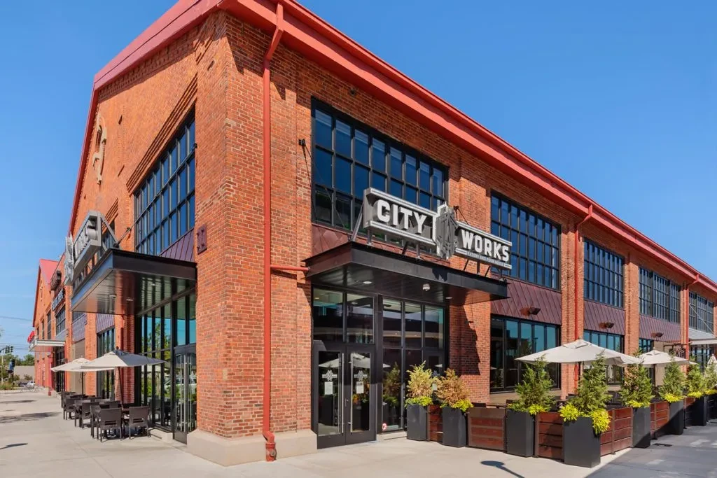 City Works Eatery and Pour House: modern brick building with patio.
