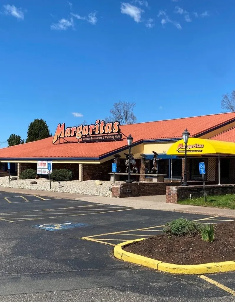 Margaritas Mexican Restaurant exterior with orange tiled roof and yellow trim.