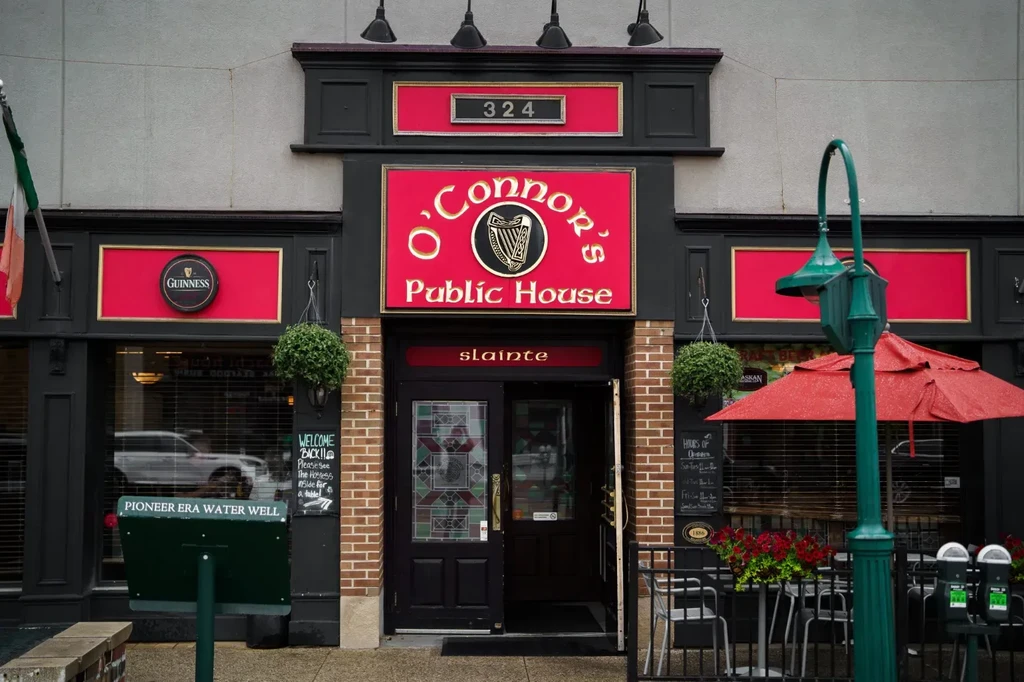 Red, black, and gold exterior of O'Connor's Public House.