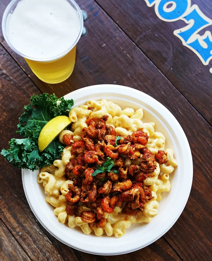 Crawfish mac and cheese with kale, lemon, and a beer.