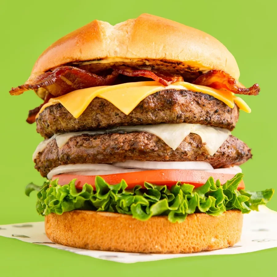 Double cheeseburger with bacon, two patties, cheese, lettuce, tomato, onion.
