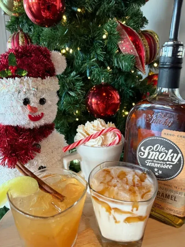 Festive drinks, Ole Smoky whiskey, snowman decoration, and Christmas tree.