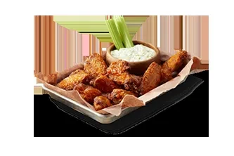 Crispy golden chicken wings, creamy dip with herbs, and celery.